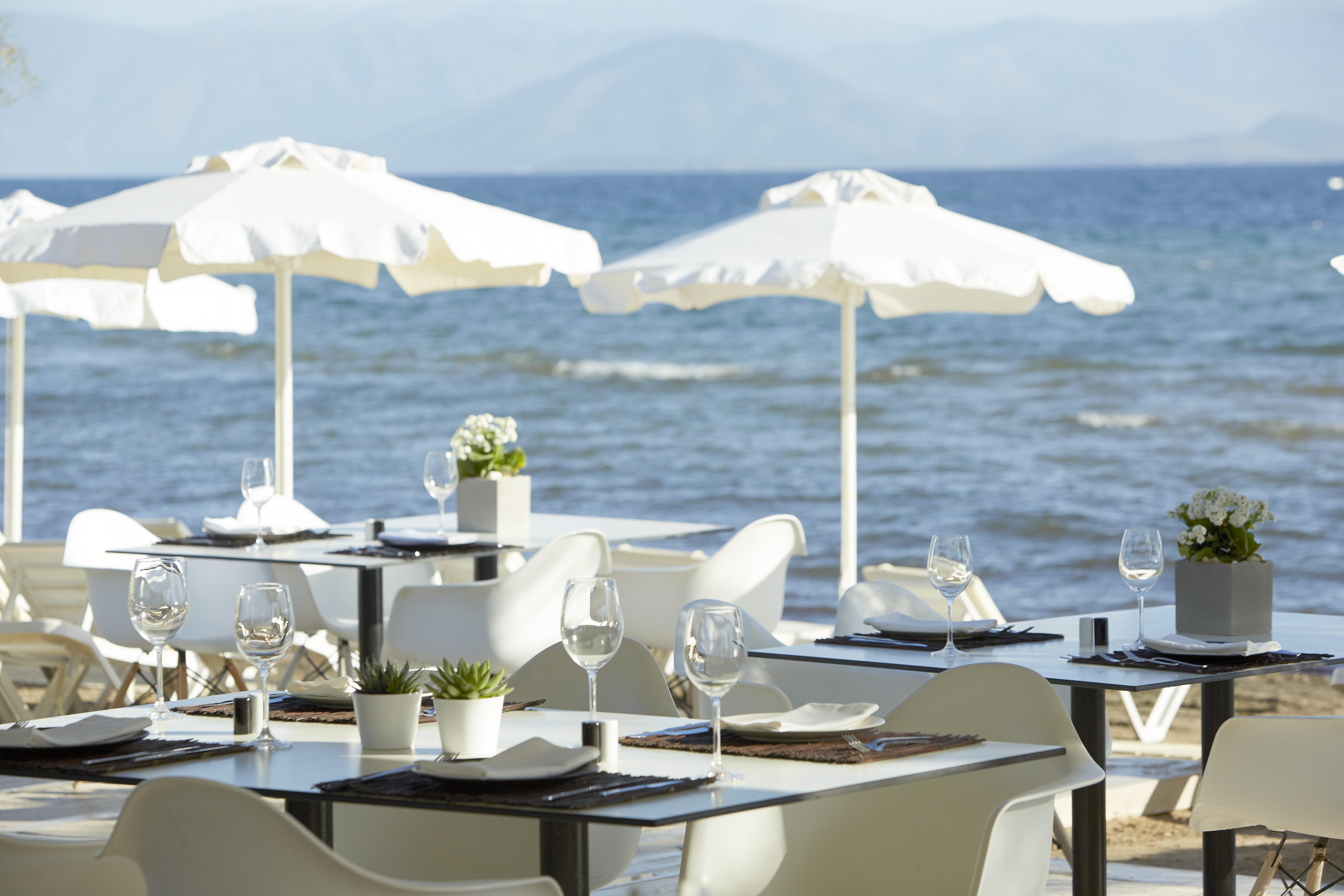 Capo Di Corfu Apart otel Kávos Dış mekan fotoğraf Beach restaurant in Marbella, Spain