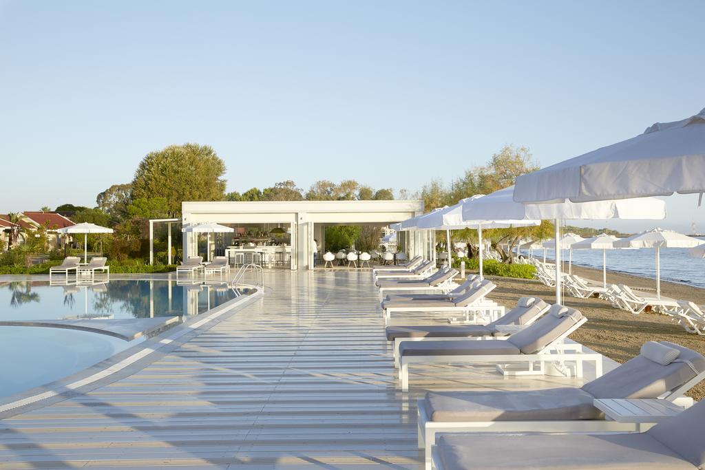 Capo Di Corfu Apart otel Kávos Dış mekan fotoğraf Beach at Porto Cervo